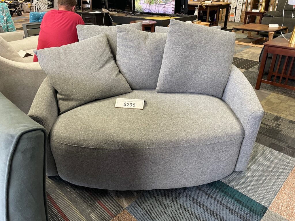 Light gray fabric rounded love seat