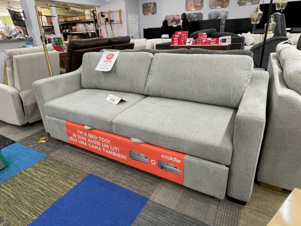 Light gray fabric sleeper couch