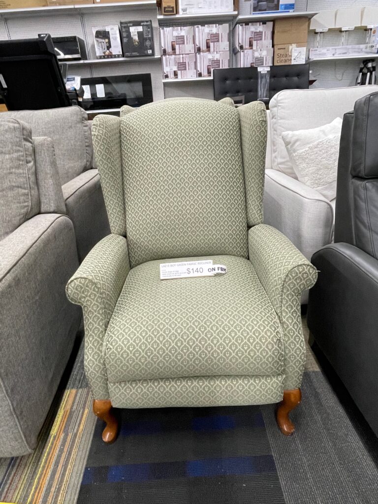 Green fabric chair with geometric design