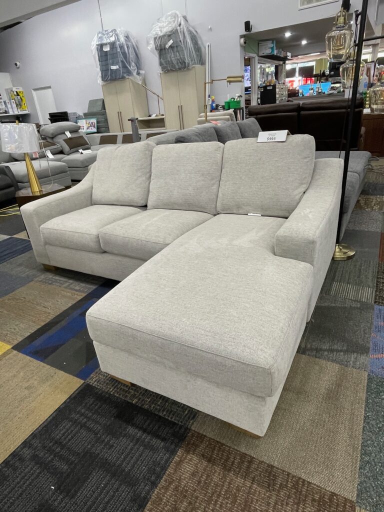 Light gray couch with lounge section