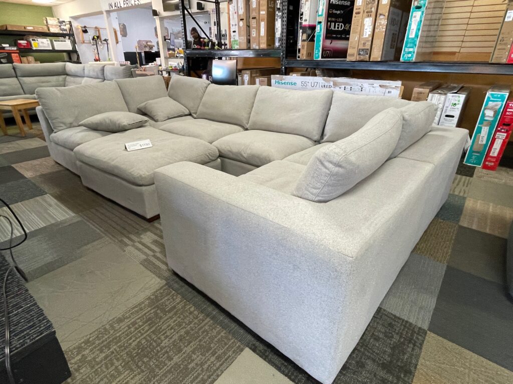 Light gray fabric sectional with ottoman